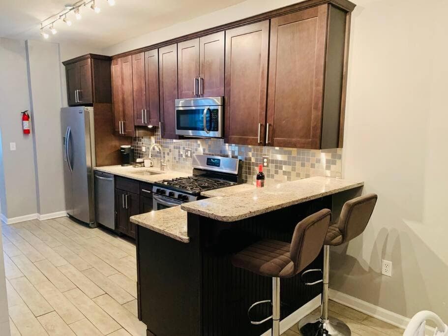 Photograph supplied for Upscale 2BD/1.5BA townhome mins to JHH & downtown