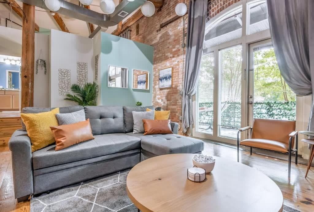 Photograph supplied for 100 Year-Old Historic Brick 2BR Loft & Large Patio & Hammocks & High Ceiling