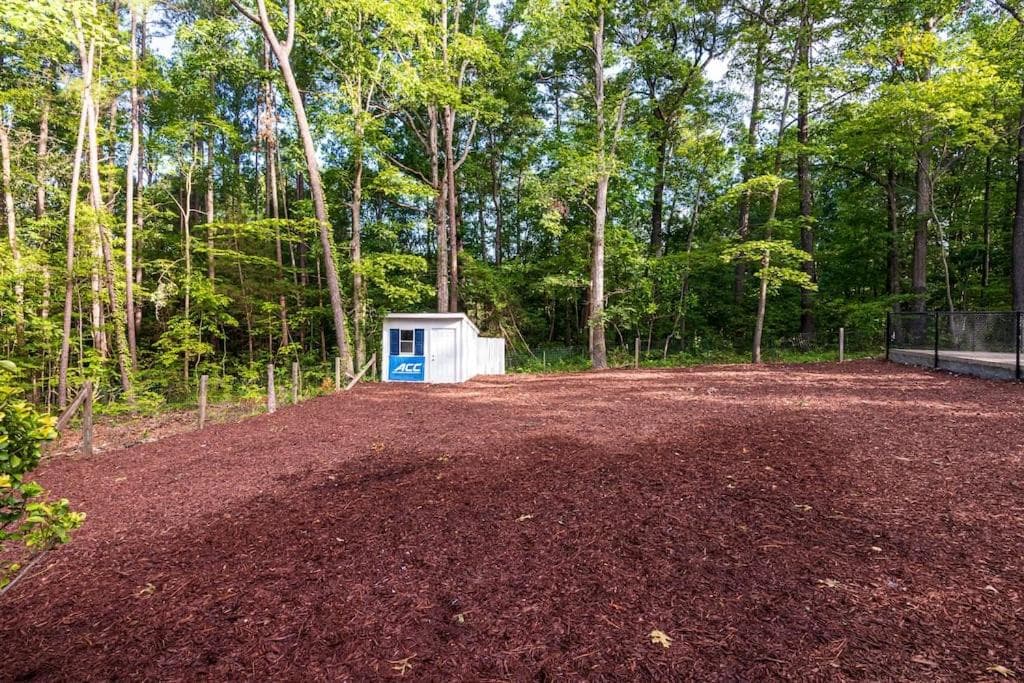 Photograph supplied for Durham Home with DUKE and UNC theme plus PICKLEBALL court