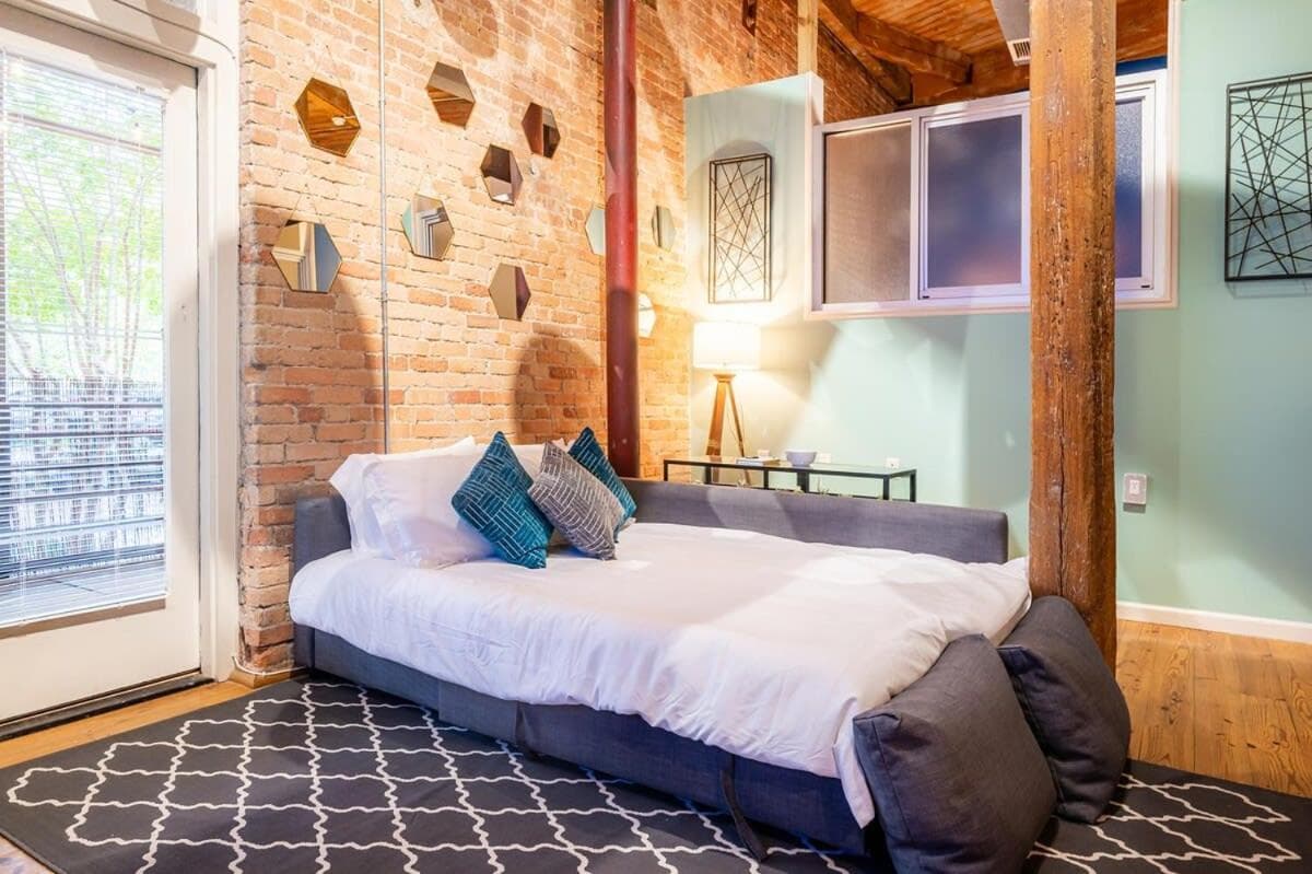 Photograph supplied for 100 Year Old Historic Brick 2BR Loft Large Patio1