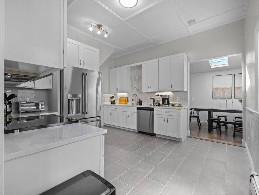 Photograph supplied for 4BR Lux Home near Harvard MIT Parking BBQ Fire Pit