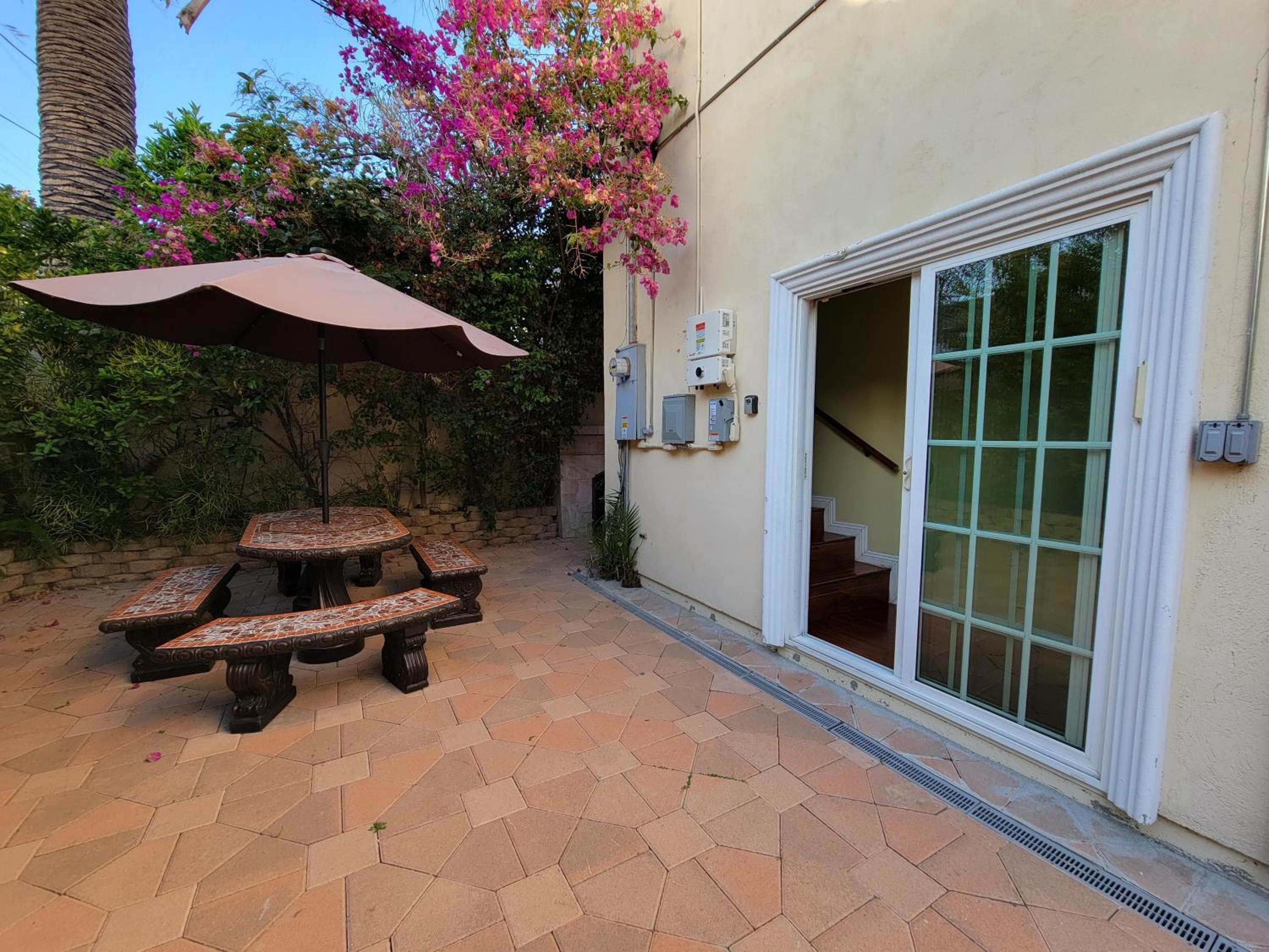 Photograph supplied for 3 bedroom apartment near MrC with patio area 5 minutes to Rodeo Drive