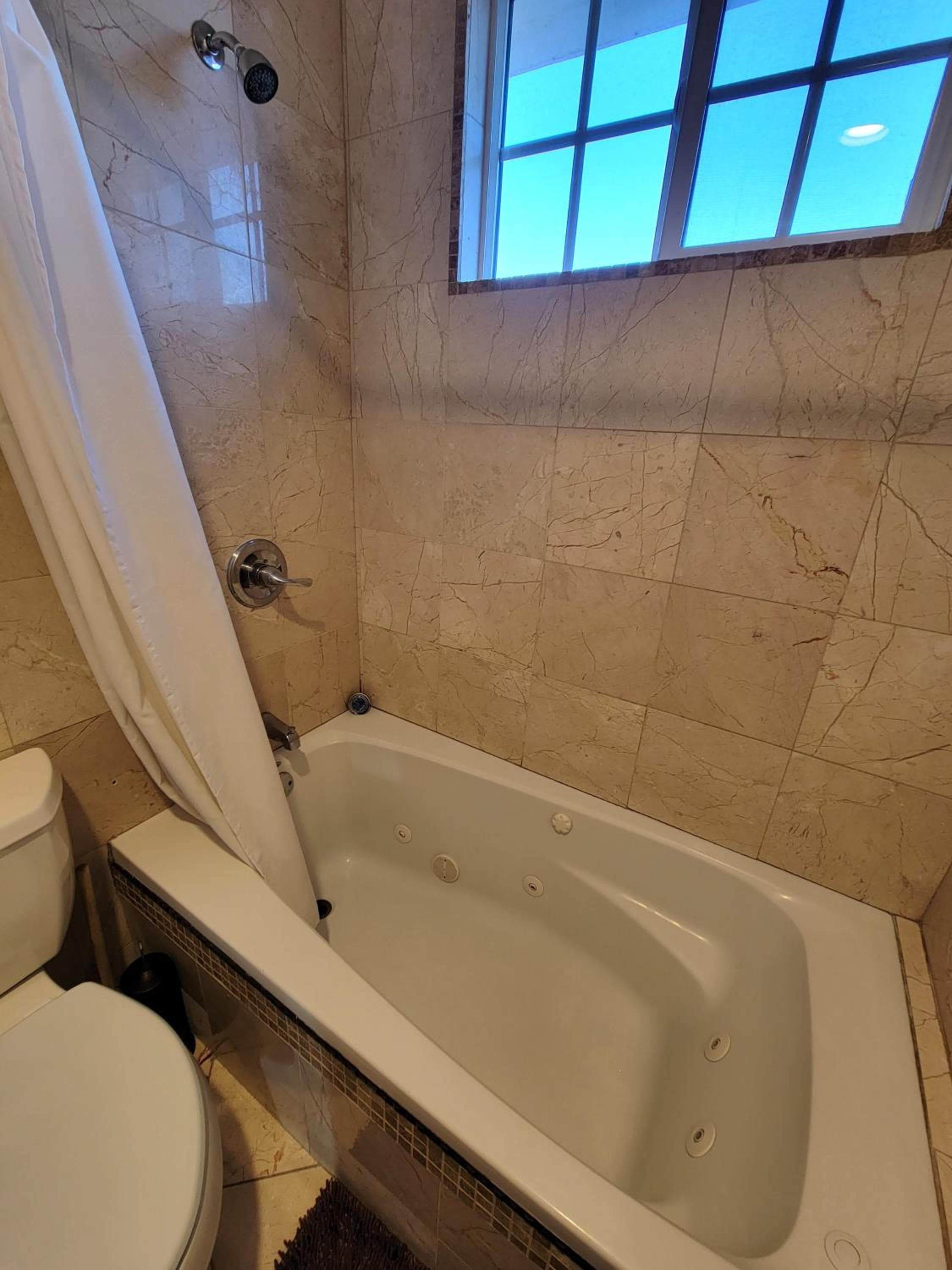 Photograph supplied for 3 bedroom apartment near MrC with patio area 5 minutes to Rodeo Drive