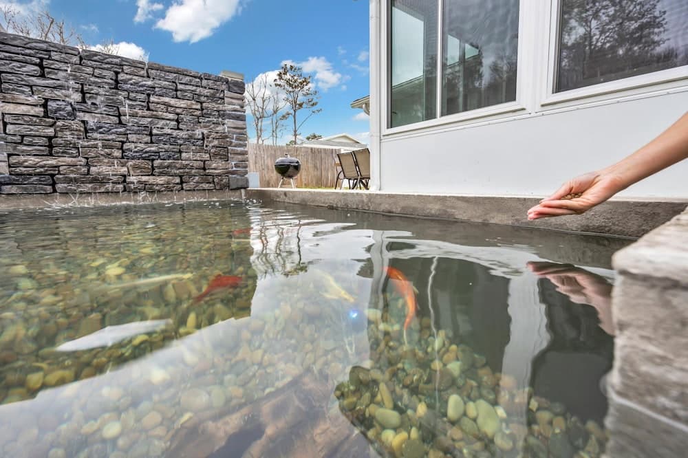 Photograph supplied for Sailfish Beach House - Pool Hottub Putting Green